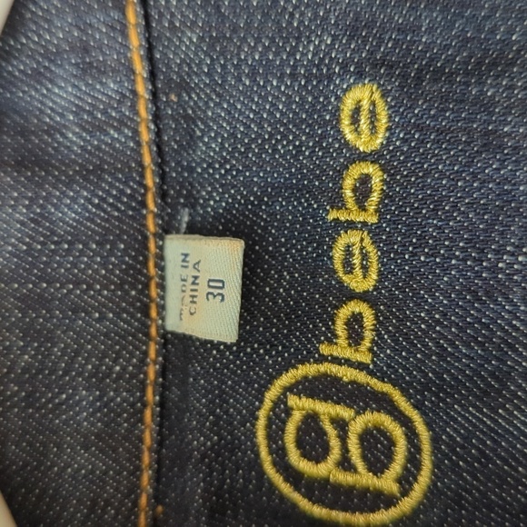 BEBE BUTTON FRONT SHORT SLEEVE DENIM ROMPER - Picture 9 of 12